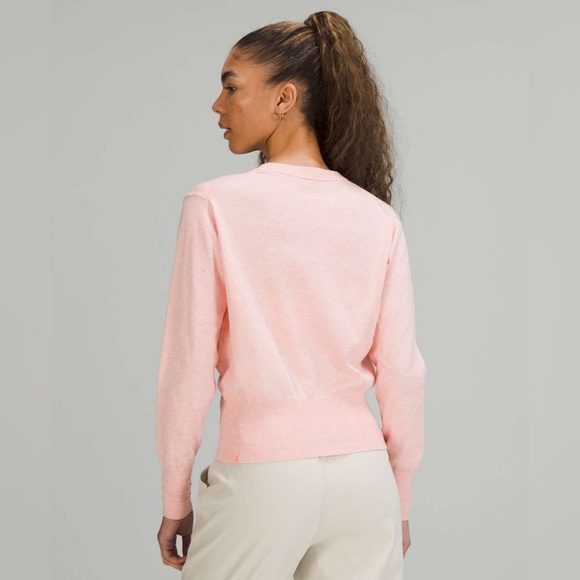 Lululemon Crossover Ribbed Waist
Sweater in Heathered Dew Pink - Picture 2 of 11